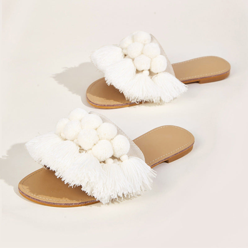 Fringed wool ball slippers
